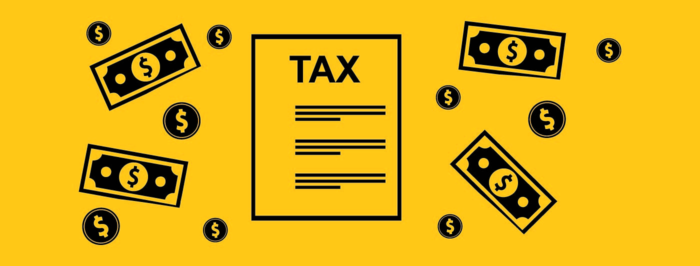 Silhouette of document with the word TAX on it and bills and coins be each side