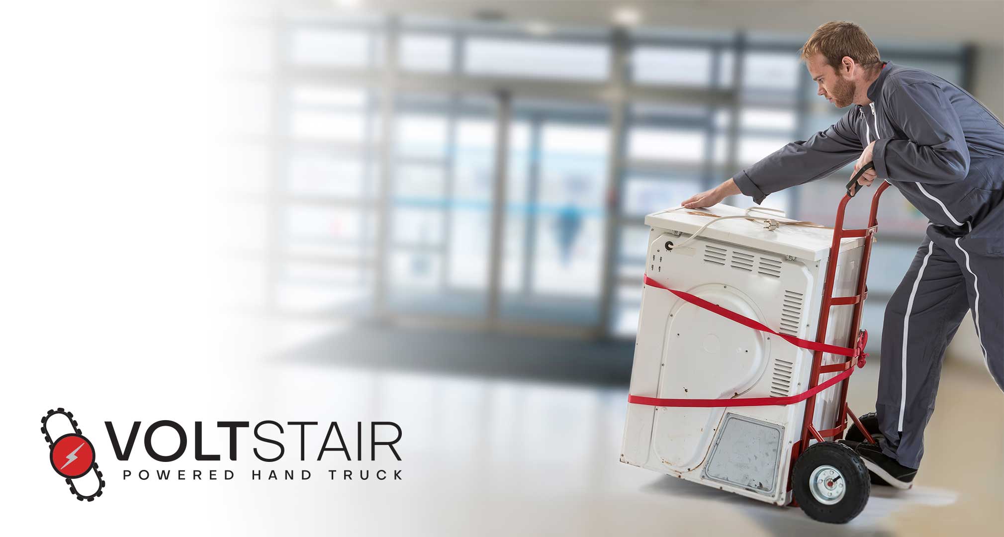 Person using a dolly to transport a big electronic device